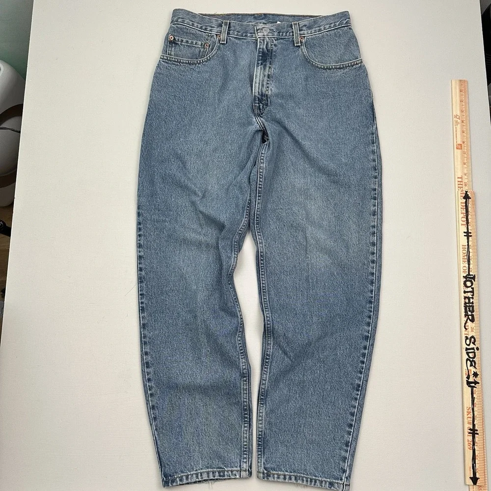 VTG Levi's 560 Loose taper Jeans Men's 34x32 Light Blue Denim Baggy Y2K Colombia